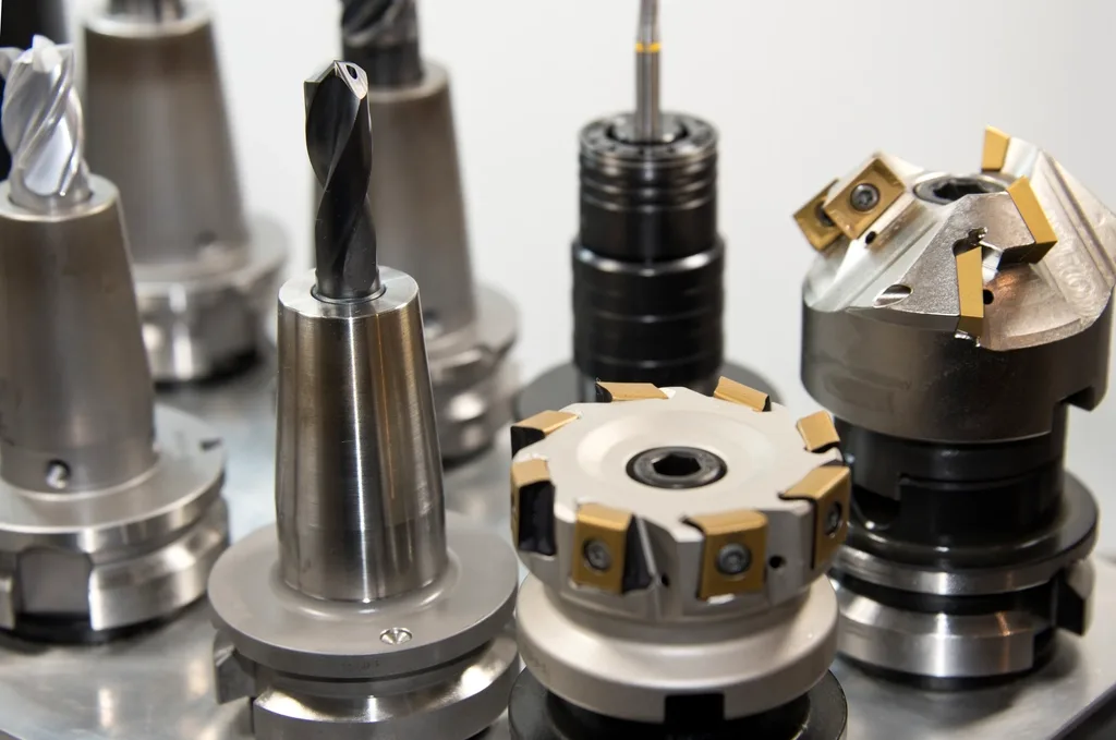 Indexable milling heads standing on a steel bench